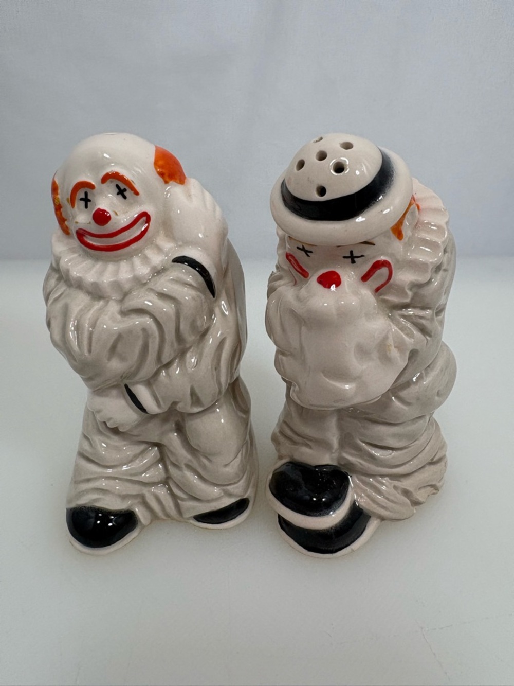 Whimsical White Clown Salt & Pepper Shaker Set with Orange and Black Accents